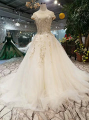 Ivory Ball Gown Tulle Bateau Cap Sleeve Backless Wedding Dress With Beading